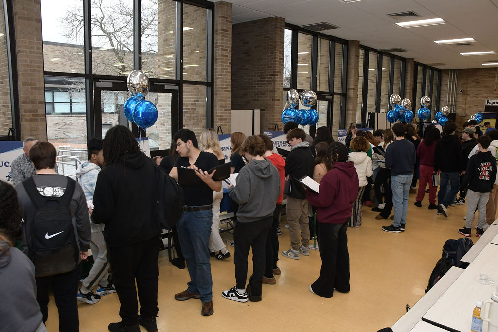 Students visiting booths