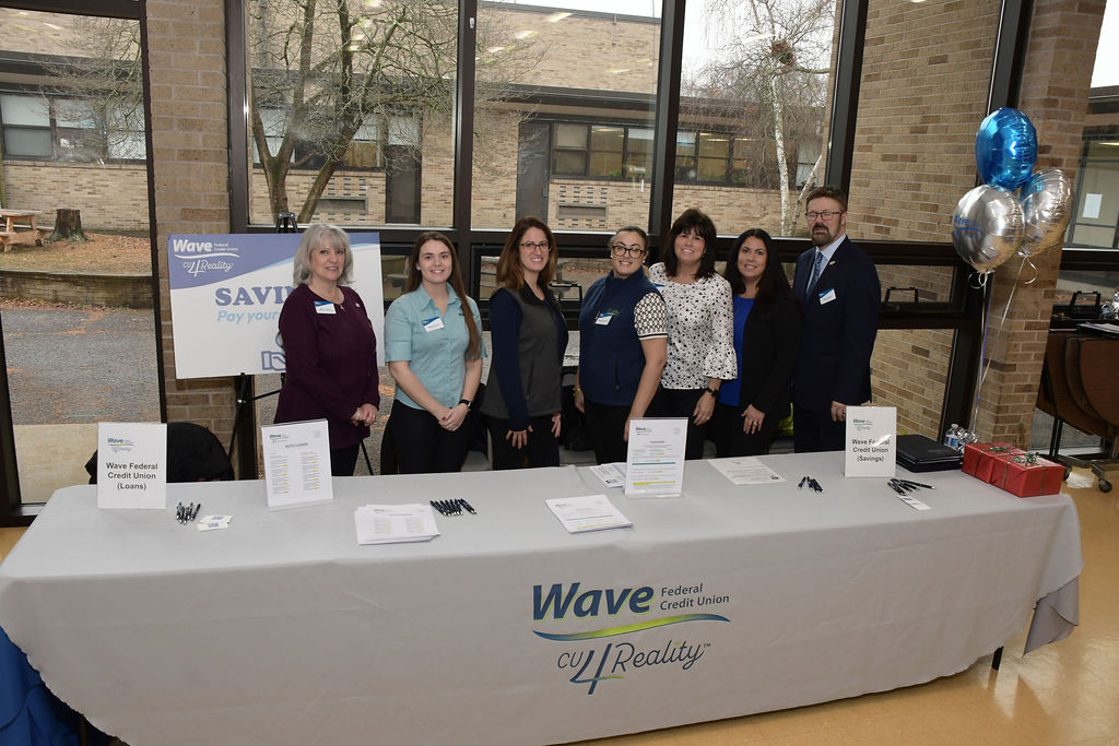 Wave FCU Team with President and CEO of Wave FCU: (left to right: Maria Morrell, Kelsey DiCarlo, April Mourato, Georgette Shamoun, Debra Baribault, Betty Pinheiro and David Dupere.