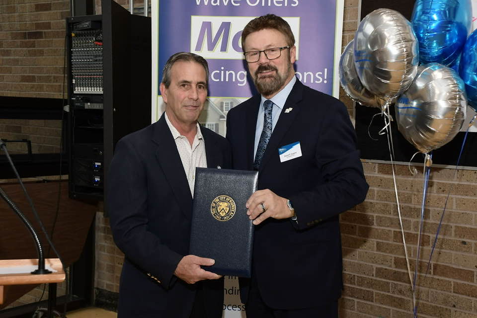 Mayor Frank Picozzi presenting proclamation to David Dupere, President and CEO of Wave FCU
