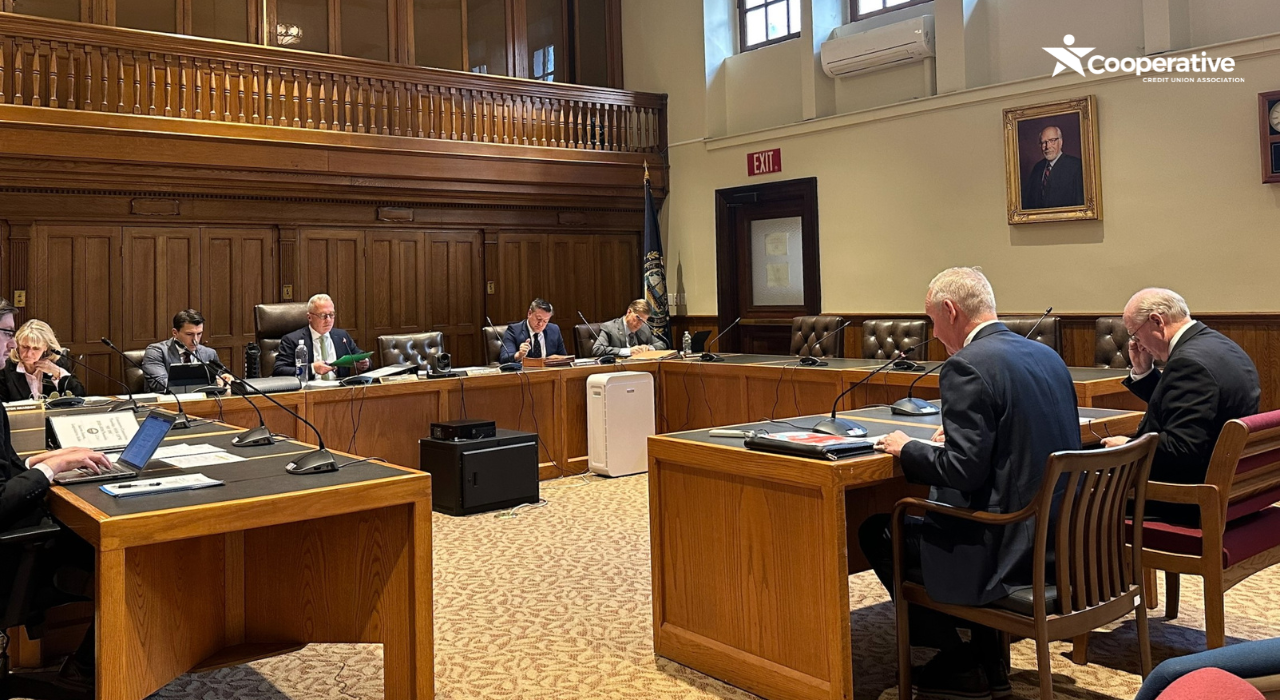 Photo of McLean and MacKnight testifying