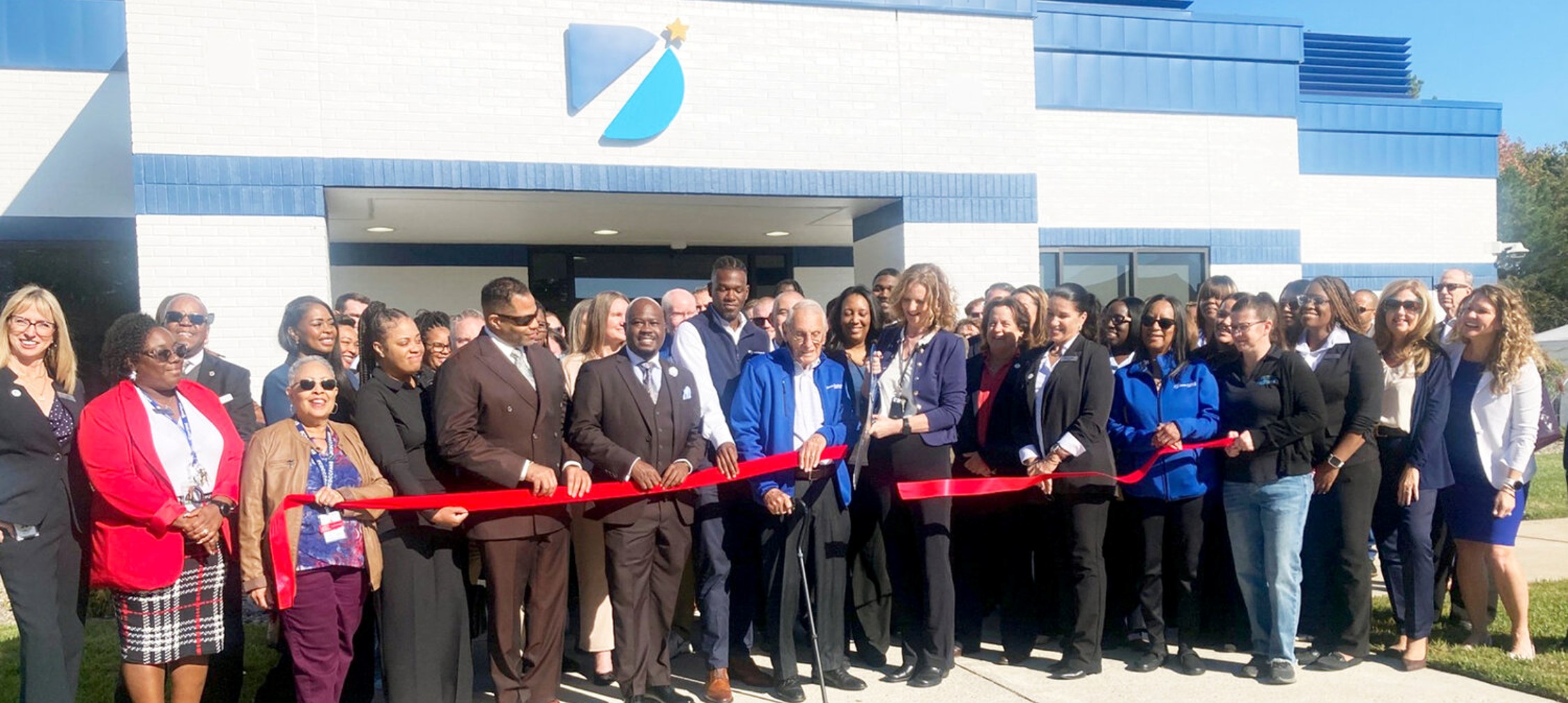 group photo of ribbon cutting