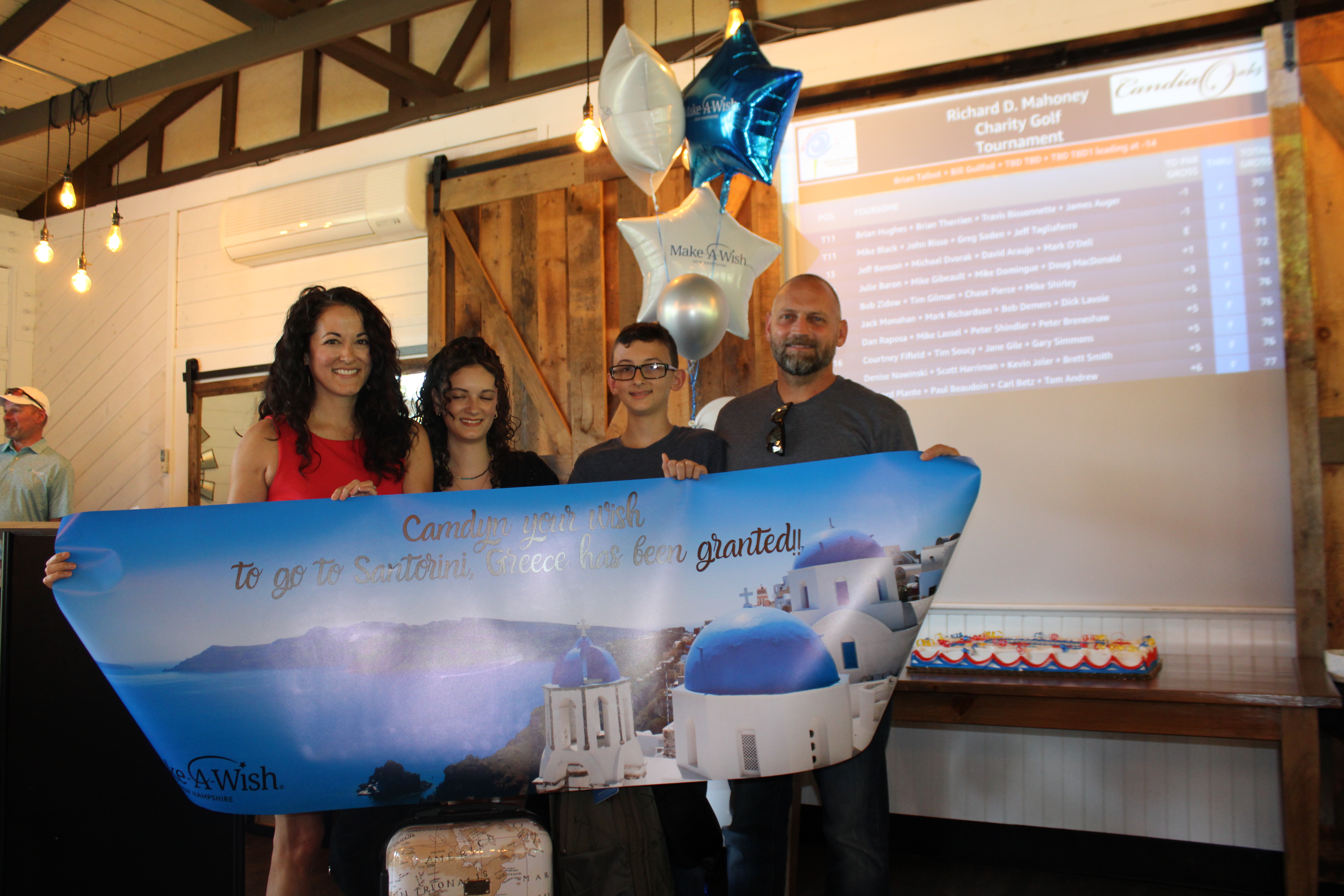 wish kid Camdyn with the announcement that her wish to visit Santorini, Greece is coming true