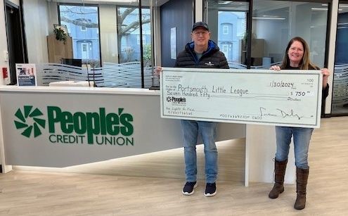 Sean Stalls, President, of Portsmouth Little League, and Courtney Hunter, Head of Community Development for People’s Credit Union.
