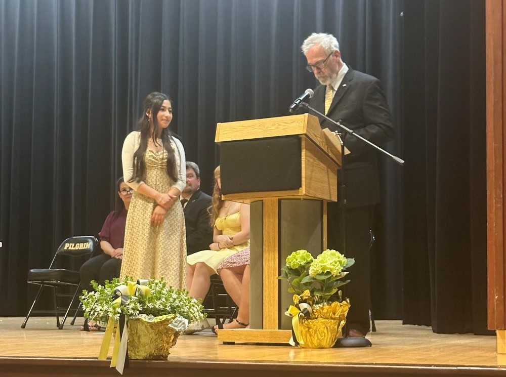 Pilgrim High School Honors Night of Board Chair Kenneth Mallette, Jr. congratulating the 2024 Donald M. Staley Memorial Scholarship winner at this school, Julissa Perez DeLeon.