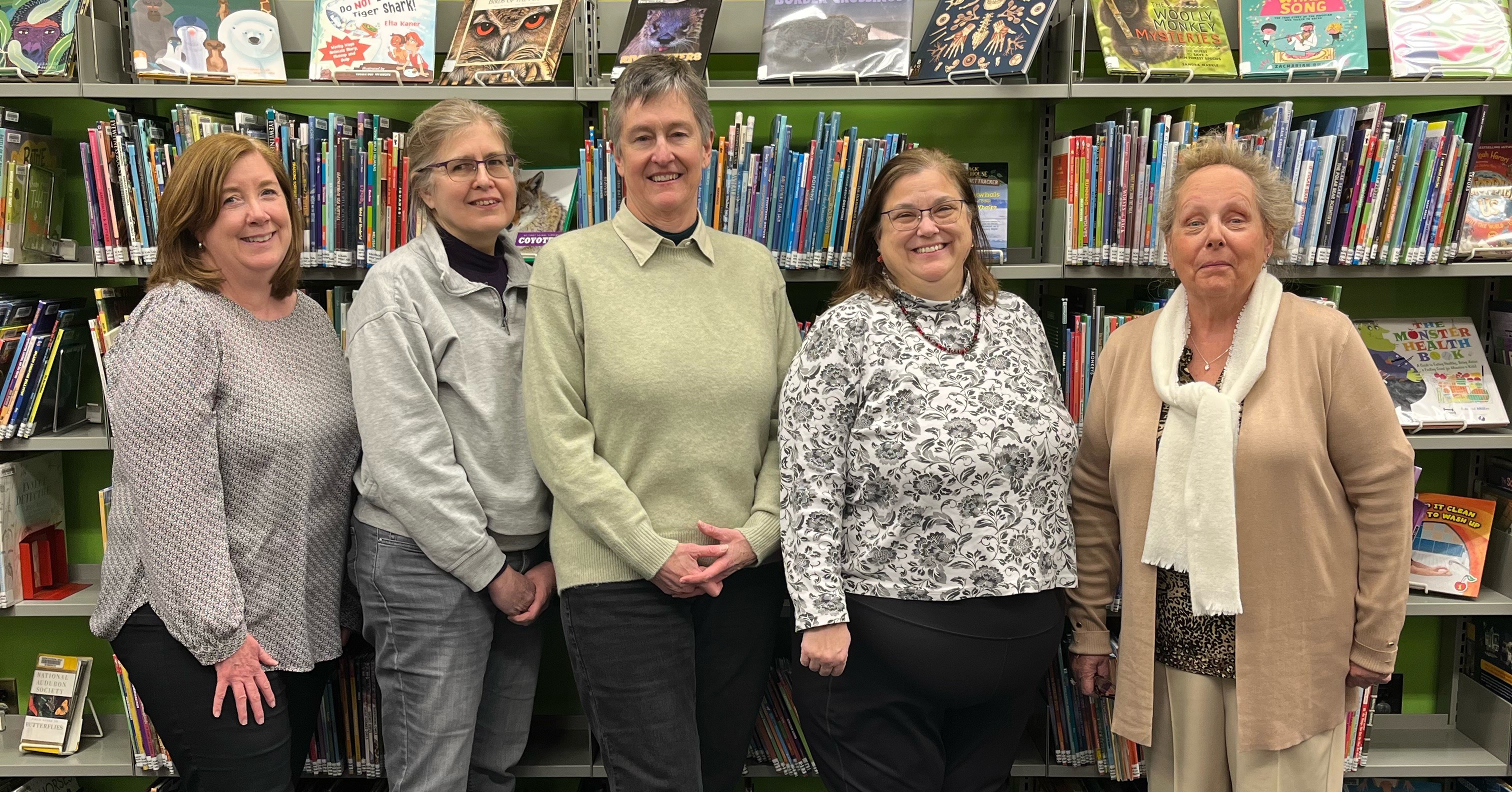 L to R: Julie Perham (Stoneham Municipal Employees Federal Credit Union), Kim Rose, Terry McDermott, Joy Lemay (Friends of the Wilmington Memorial Library) and Susan Boule (Stoneham Municipal Employees Federal Credit Union).